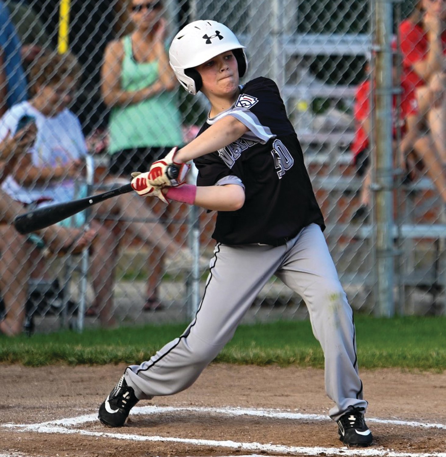SWINGING AWAY: North’s Jamison O’Dea takes a swing while up to bat against Coventry.